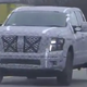 Illustration for article titled 2016 Nissan Titan Spied With A 'Range Rover Style' Premium Face
